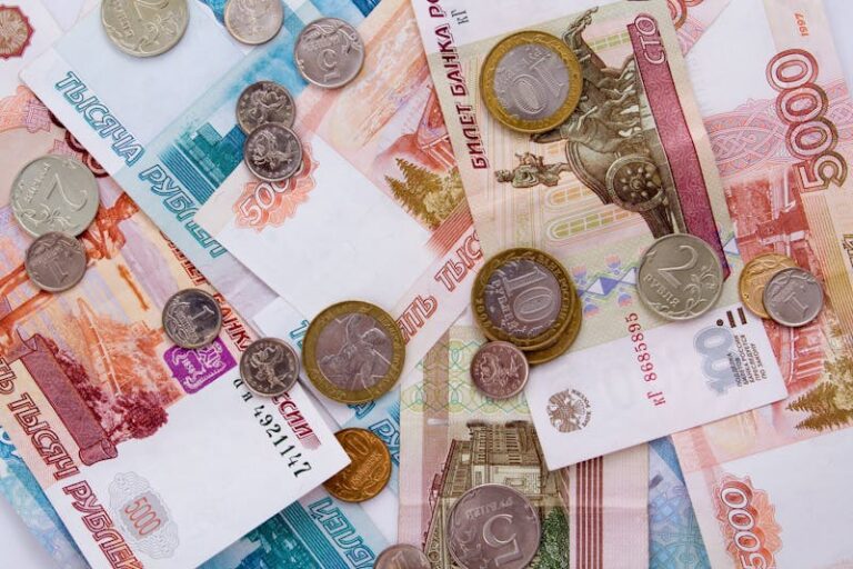 Russian ruble banknotes and coins on a table