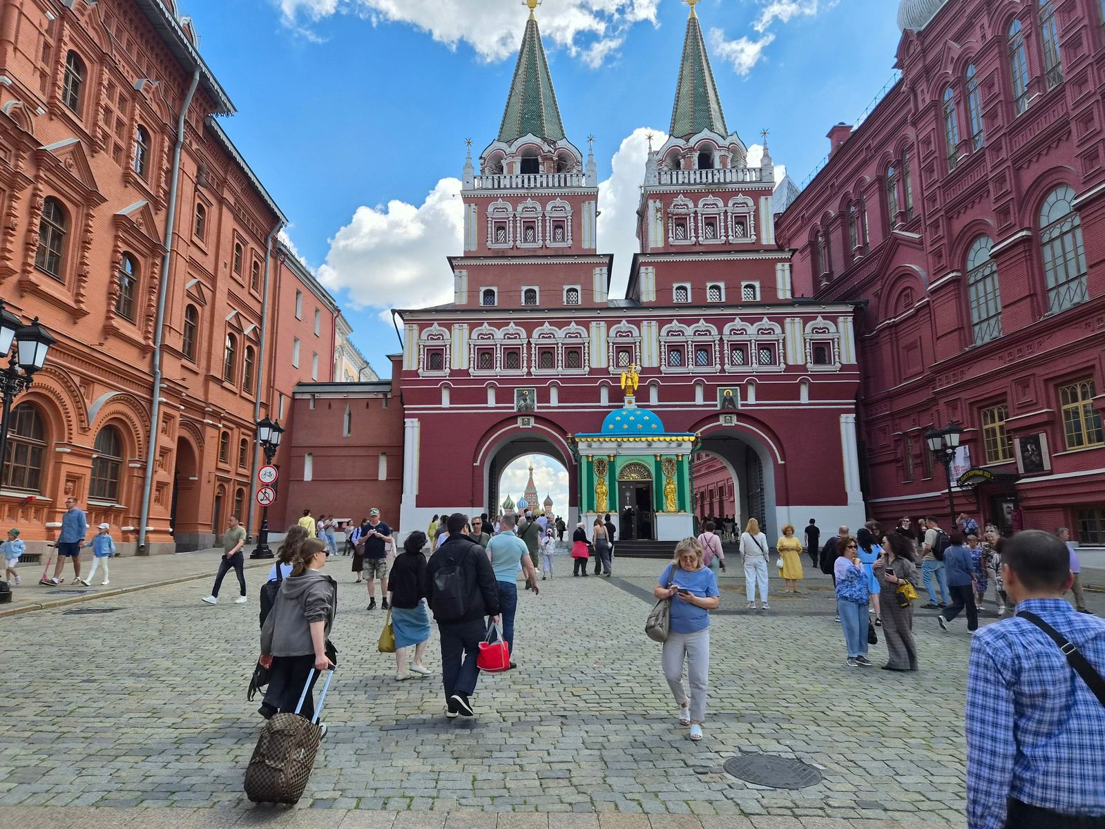 Resurrection Gate leading into Red Square, with the domes of St Basil's Cathedral visible through the archway