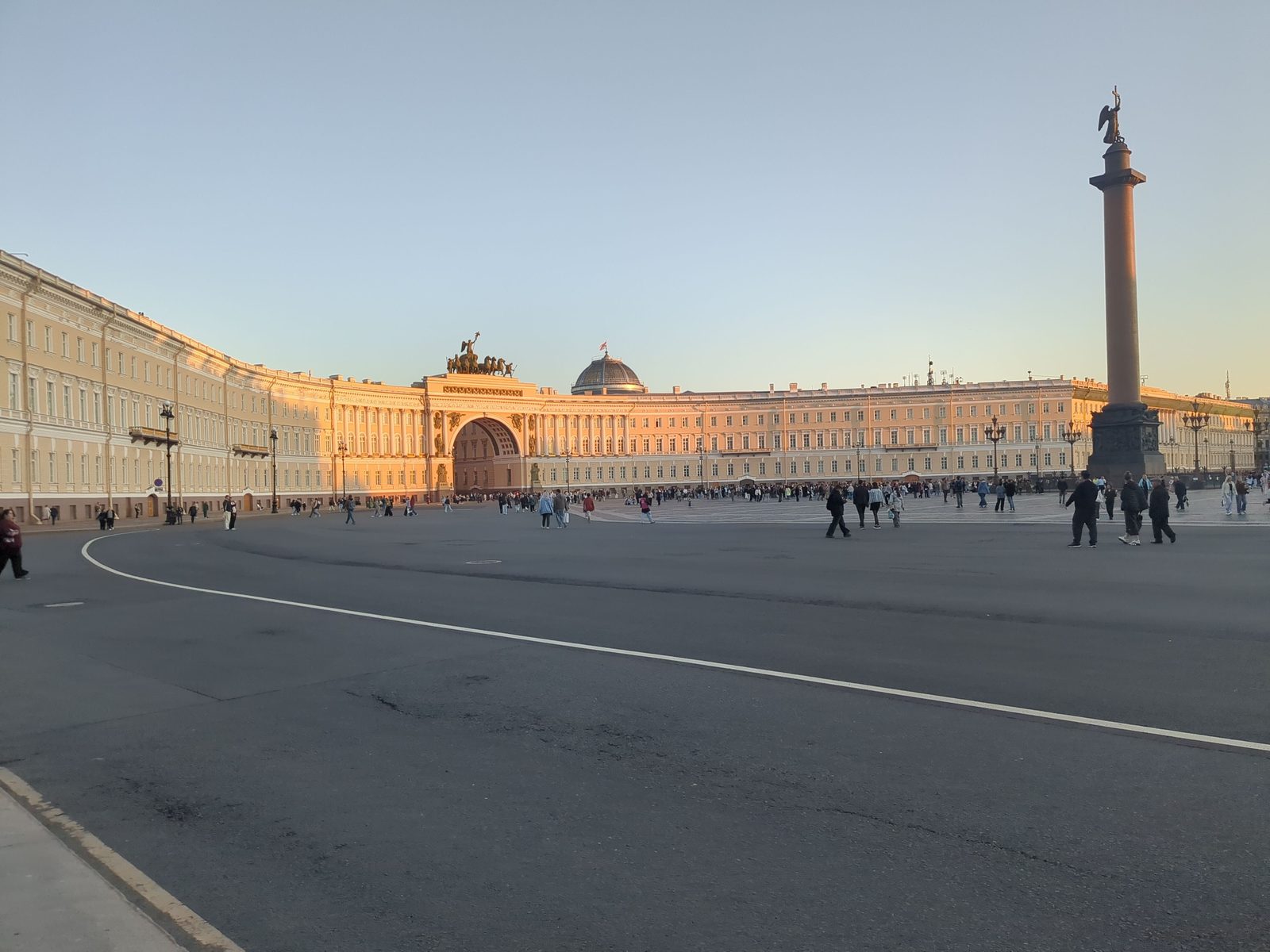 Palace Square in St Petersburg in the evening light, with the Alexander Column and the General Staff Building