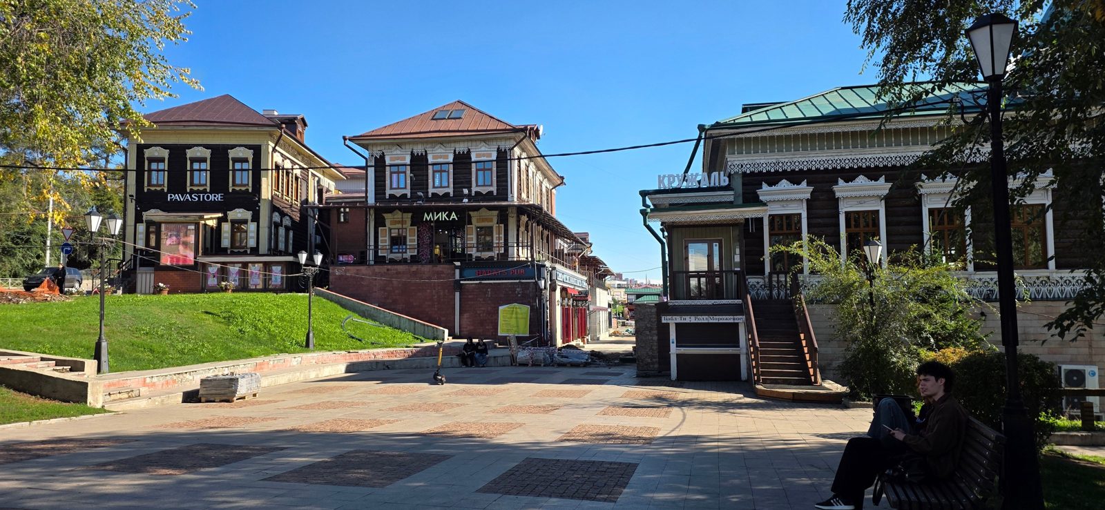 Restored traditional wooden houses in the 130th Quarter of Irkutsk on a sunny day