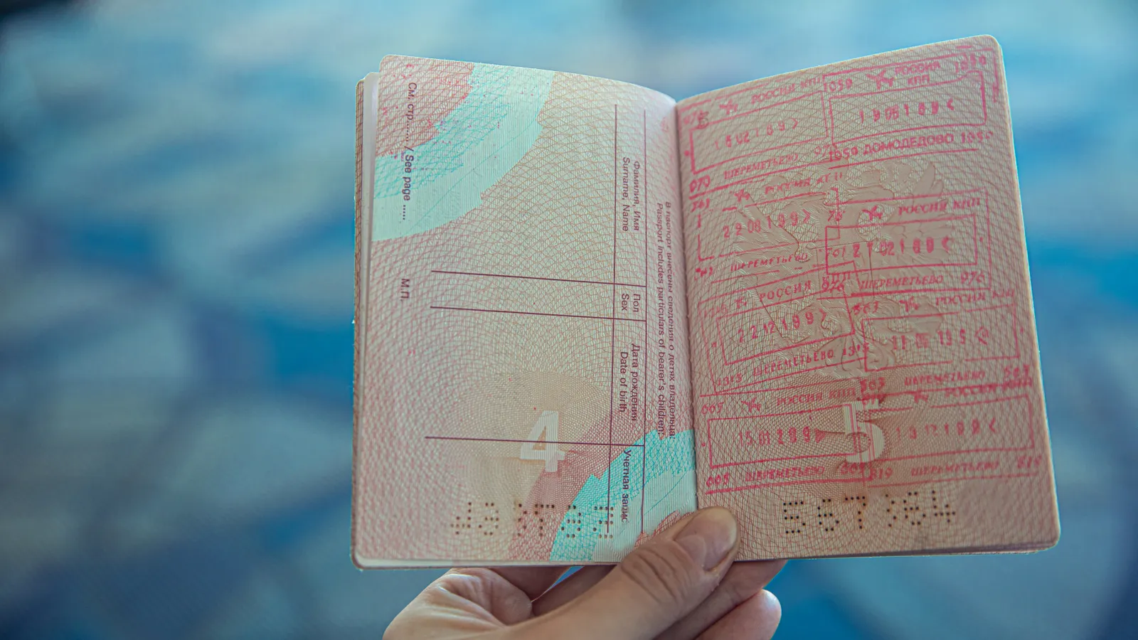 Open passport with Russian entry stamps