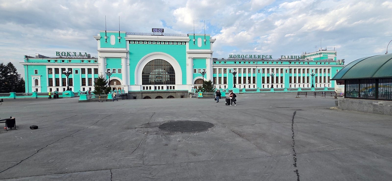 The turquoise and white facade of Novosibirsk-Glavny railway station